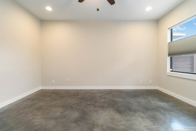 spare room with ceiling fan