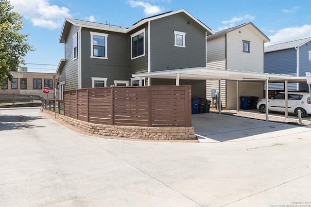 view of front of house featuring a carport