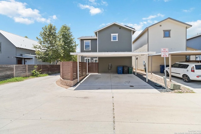 view of front property featuring a carport