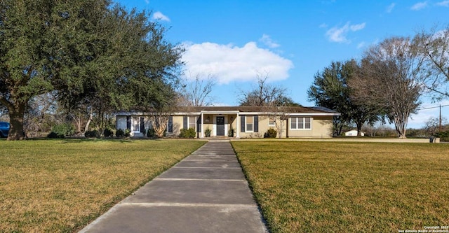 ranch-style house with a front lawn