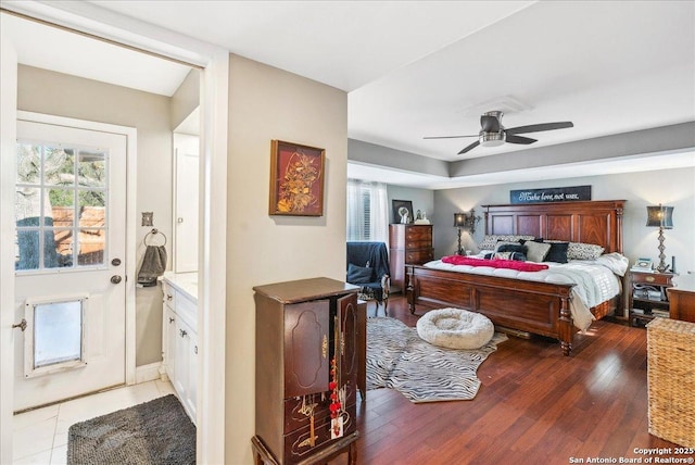 bedroom with wood-type flooring and ceiling fan