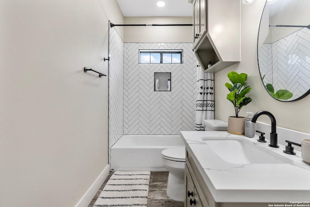 full bathroom with hardwood / wood-style flooring, tiled shower / bath, vanity, and toilet