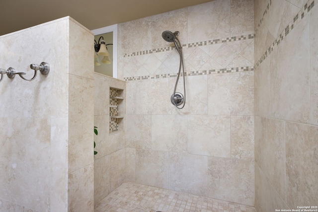 bathroom featuring tiled shower