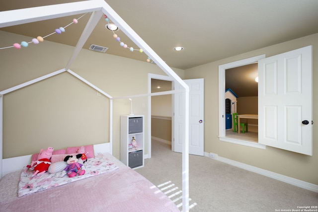 bedroom featuring light colored carpet