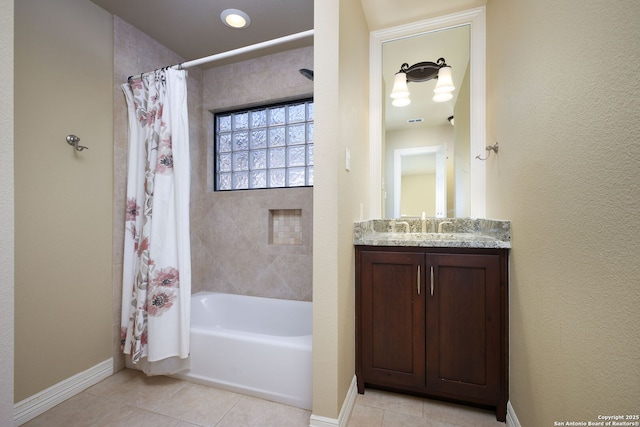 bathroom with vanity, shower / bath combination with curtain, and tile patterned floors