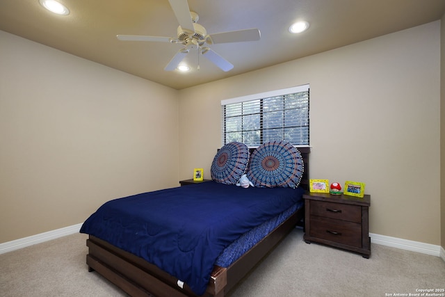 bedroom with light colored carpet and ceiling fan