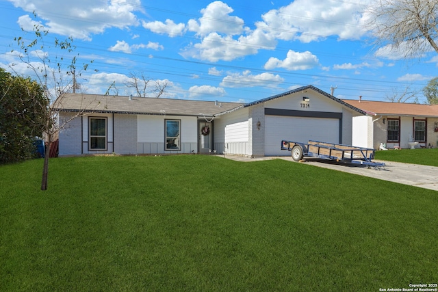 single story home featuring a garage and a front lawn