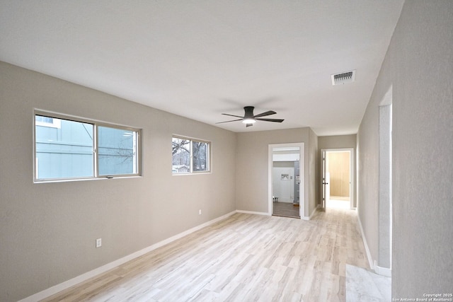 unfurnished bedroom featuring light hardwood / wood-style floors and ceiling fan