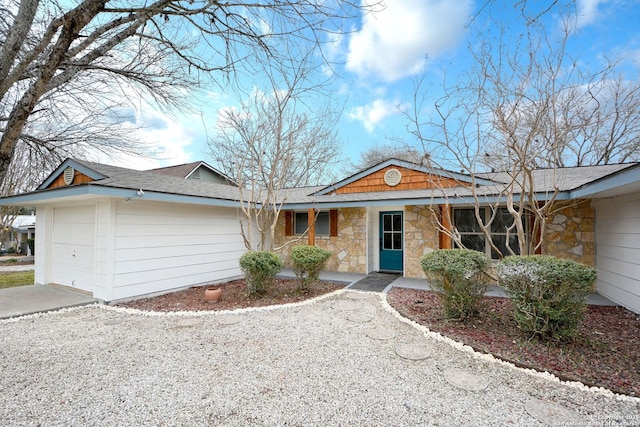 single story home featuring a garage