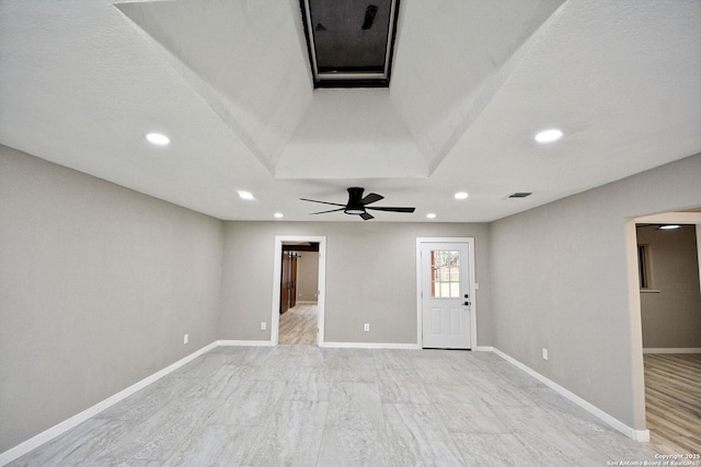 unfurnished room with ceiling fan