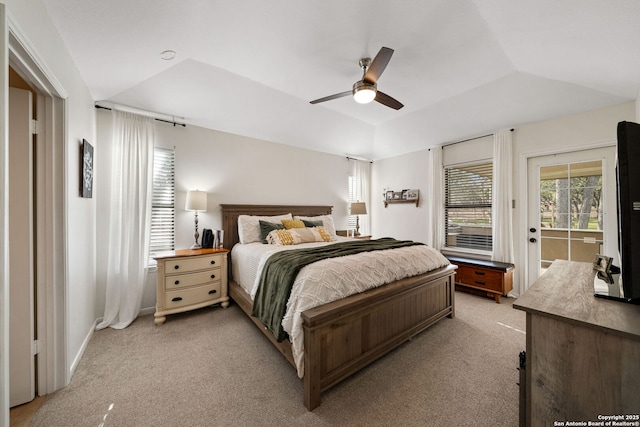 carpeted bedroom with lofted ceiling, access to outside, and ceiling fan