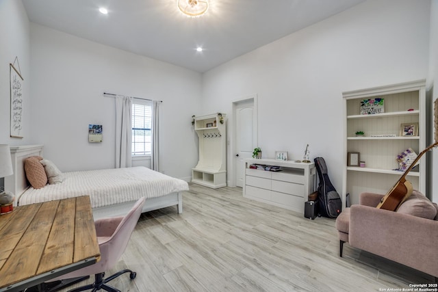 bedroom with light wood-type flooring