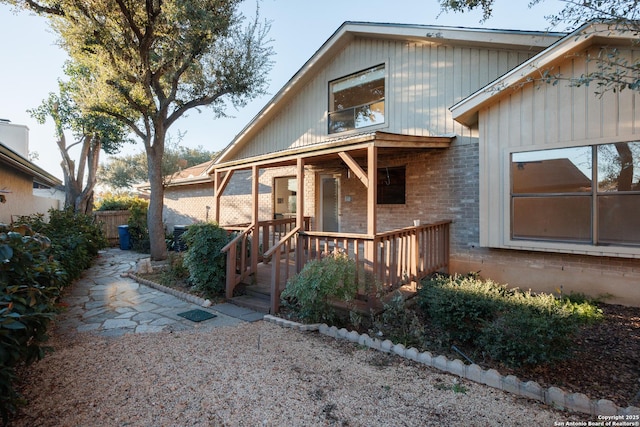 view of front of property featuring a wooden deck