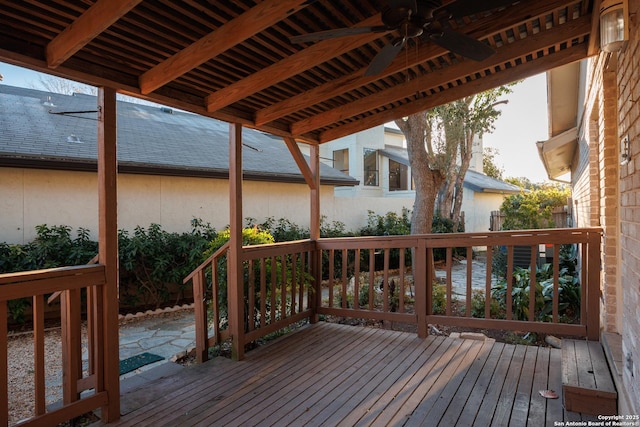 wooden terrace featuring ceiling fan