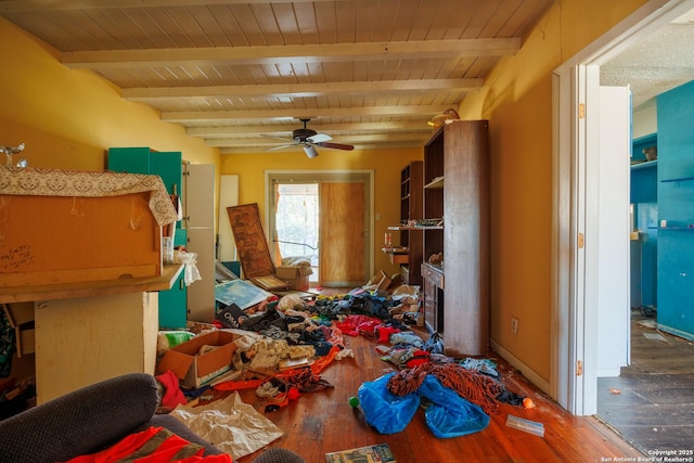 miscellaneous room with ceiling fan, wood ceiling, and beam ceiling