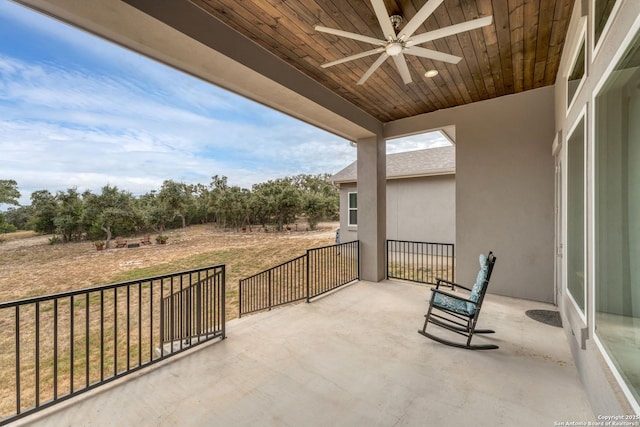 view of patio / terrace featuring ceiling fan