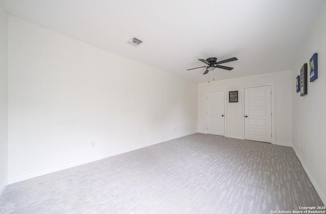 spare room featuring ceiling fan