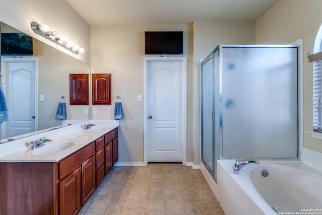 bathroom featuring vanity and plus walk in shower