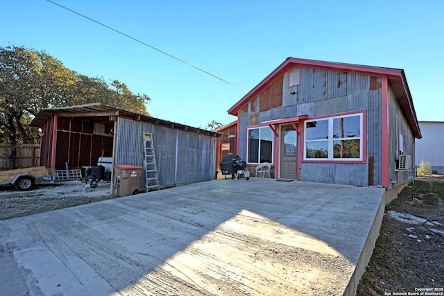 view of front of home featuring cooling unit