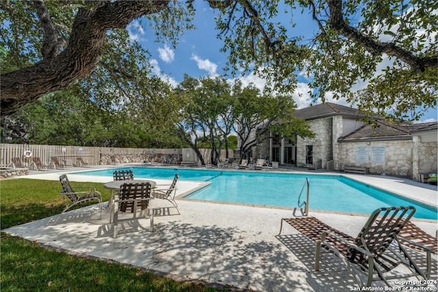 view of pool with a patio area