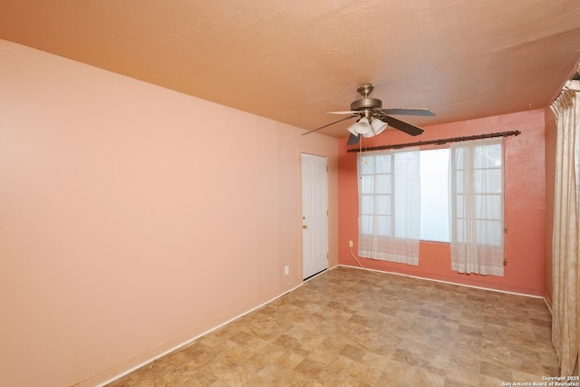 empty room with ceiling fan