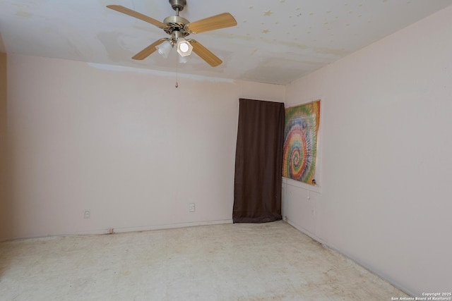 empty room featuring ceiling fan