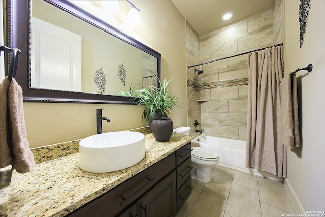 full bathroom featuring shower / tub combo, vanity, tile patterned flooring, and toilet