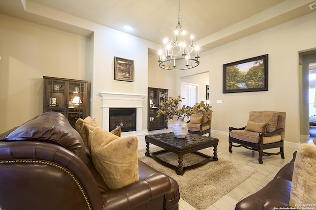 living room with a notable chandelier