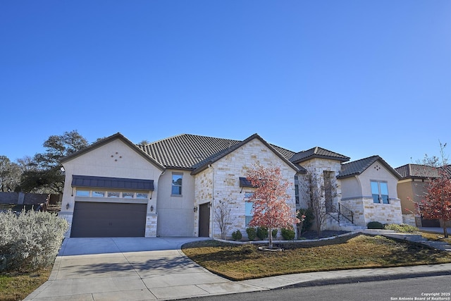 view of front of house with a garage