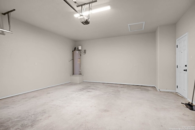 garage featuring a garage door opener and electric water heater