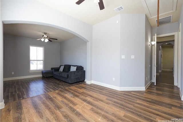 unfurnished room featuring ceiling fan and dark hardwood / wood-style flooring