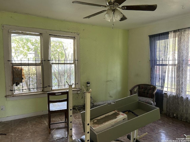 miscellaneous room featuring ceiling fan