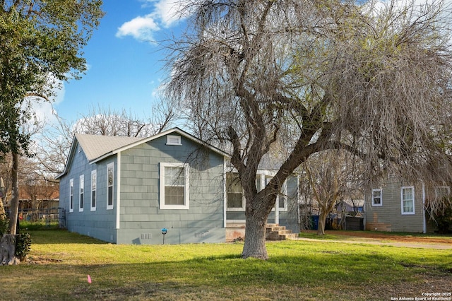 view of front of home with a front yard