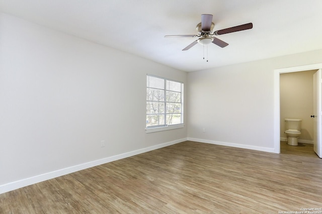 spare room with ceiling fan and light hardwood / wood-style flooring