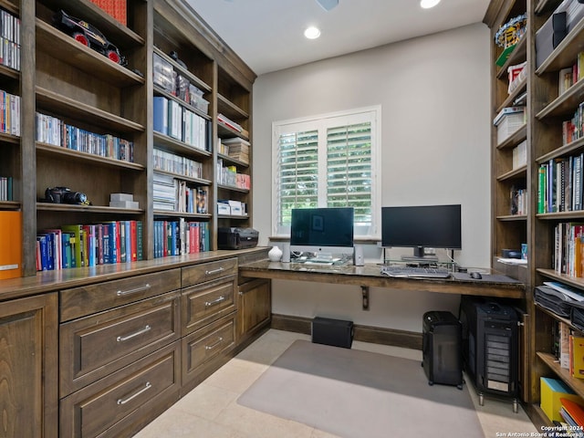 office space featuring built in desk