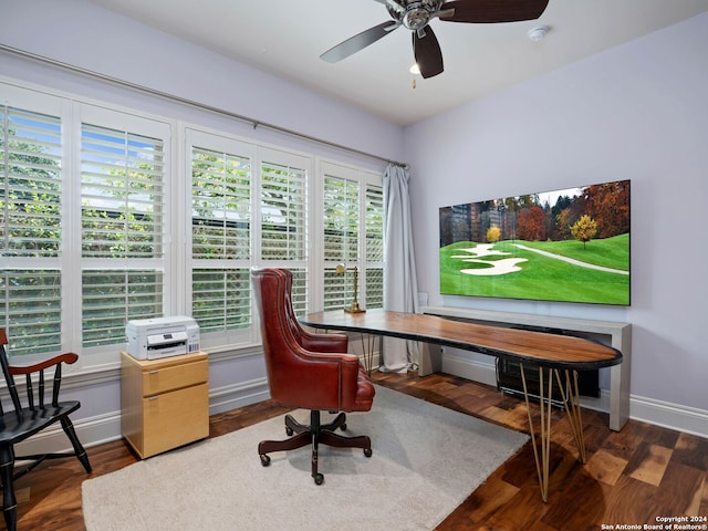 office space with ceiling fan, a wealth of natural light, and dark hardwood / wood-style flooring