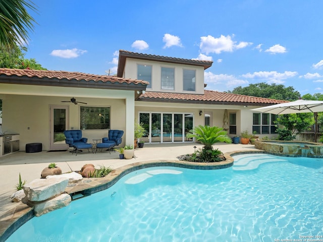 back of property with a pool with hot tub, an outdoor living space, a patio, and ceiling fan