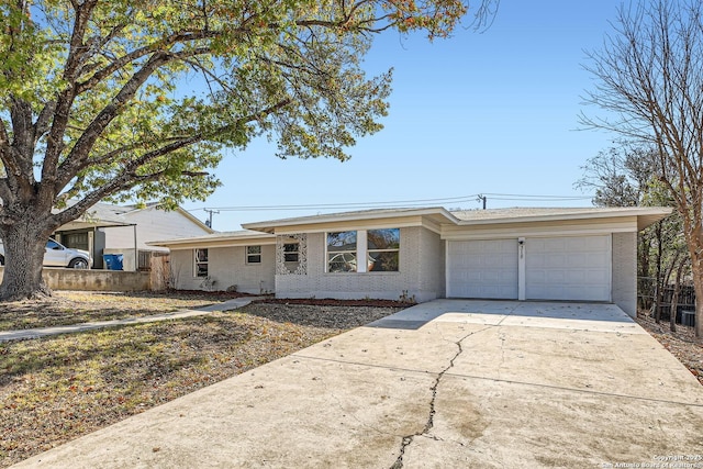 ranch-style home with a garage