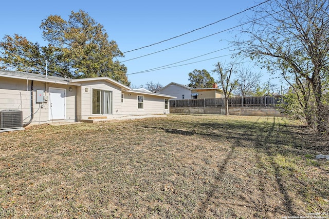 view of yard with central AC