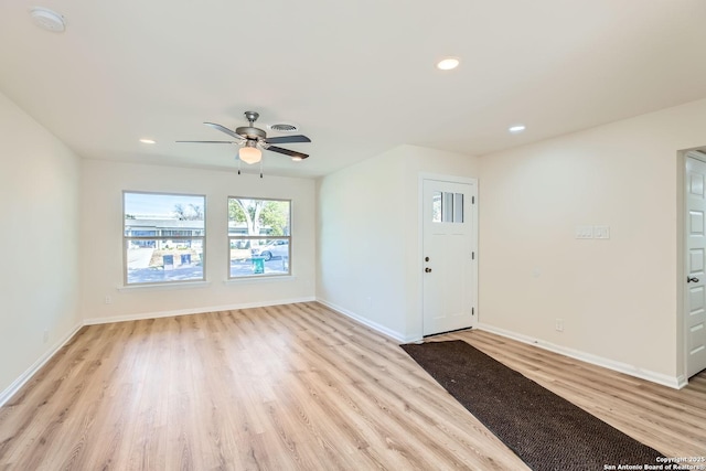 entryway featuring ceiling fan and light hardwood / wood-style floors