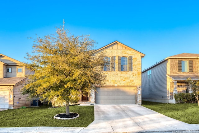 view of front facade featuring a garage and a front yard