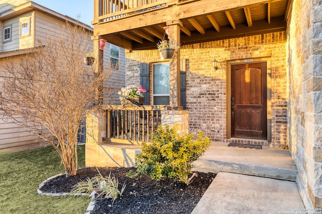 doorway to property featuring a porch