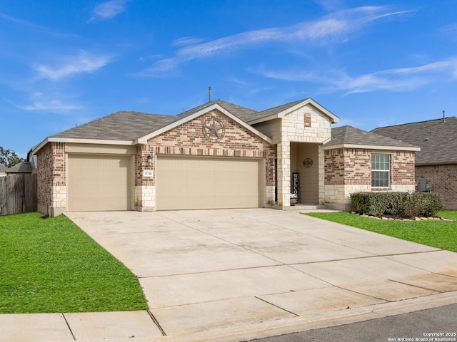 ranch-style home featuring a garage and a front lawn