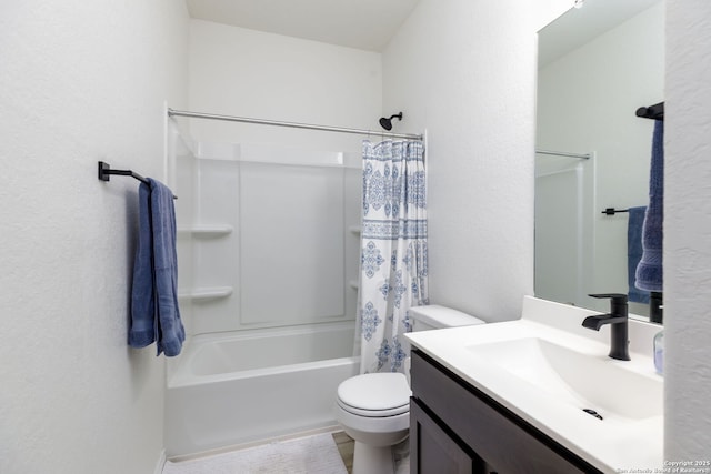 full bathroom with vanity, shower / bath combo with shower curtain, and toilet