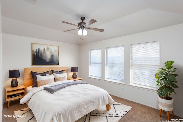 carpeted bedroom featuring ceiling fan