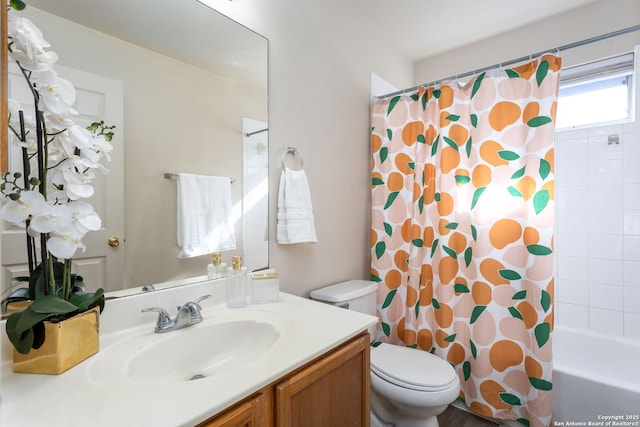 full bathroom featuring shower / tub combo with curtain, vanity, and toilet