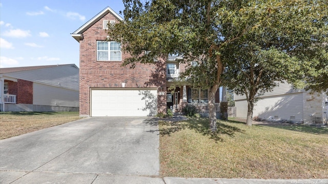 view of front facade with a garage and a front yard