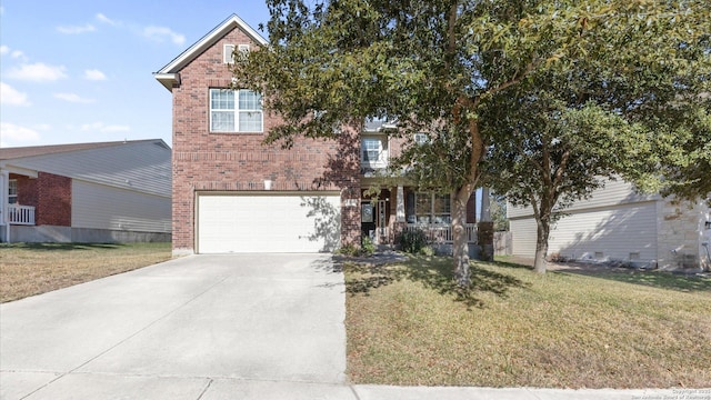 view of front facade with a garage and a front lawn