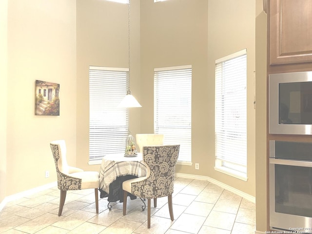 dining room with light tile patterned floors