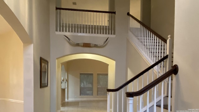 stairs with a towering ceiling